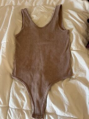 Ribbed Sleeveless One-Piece Bodysuit in Taupe